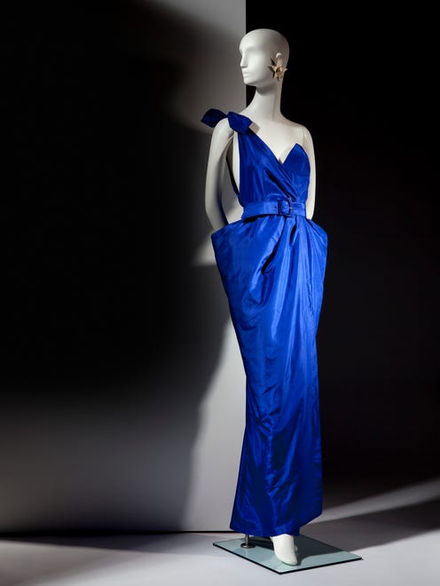 Thierry Mugler, French, born 1948 Strasbourg, France.
Dress and belt, 1985. Silk taffeta. Museum purchase of Emphatics Archive with funds provided by: Barbara Anderson, Arizona Costume Institute, Milena and Tony Astorga, Jacquie Dorrance, Kelly Ellman, Michael and Heather Greenbaum, Diane and Bruce Halle, Nancy R. Hanley, Ellen Katz, Miriam Sukhman. Photo by Ken Howie.