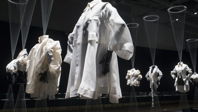 La Ronde (center), Spring/Summer, 1993, is part of the exhibit of Italian fashion designer Gianfranco Ferre, "The White Shirt According To Me," in the Steele Gallery at the Phoenix Art Museum, 1625 N. Central Ave., Phoenix.