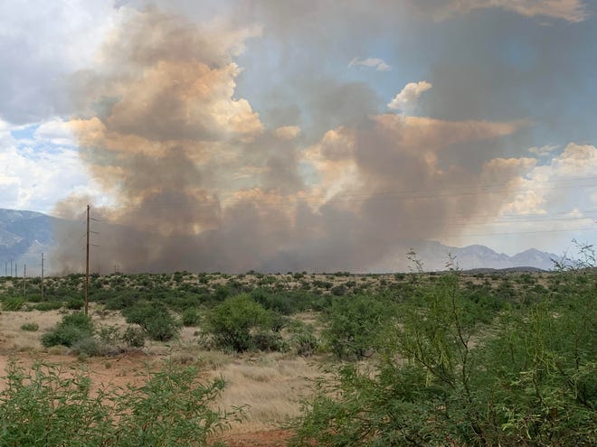 The Bowl Creek Fire burns northwest of Oracle Junction, Ariz., on July 24, 2023.