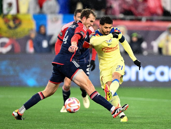 Apr 2, 2024; Foxborough, MA, USA; Club America forward Henry Martin (21) shoots the ball past New England Revolution defender Henry Kessler (4) to score during the first half at Gillette Stadium. Mandatory Credit: Brian Fluharty-USA TODAY Sports