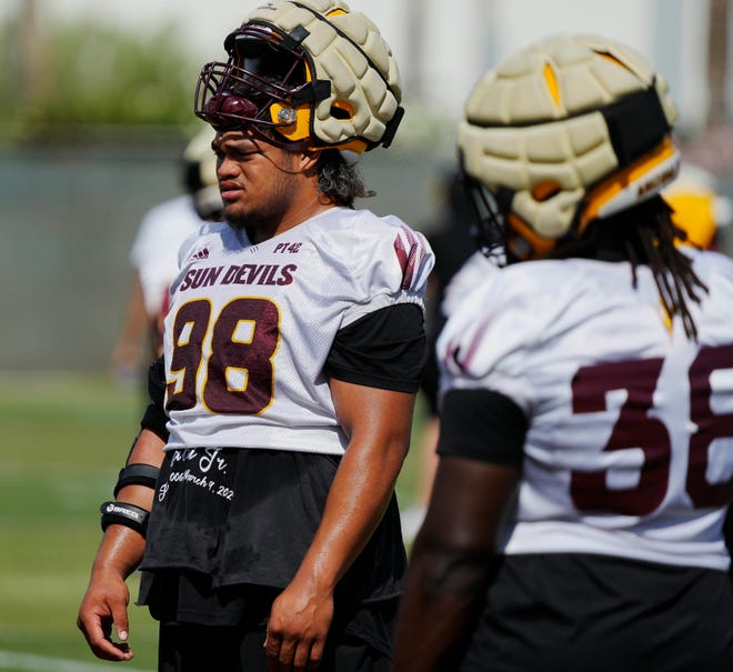 ASU defensive lineman Jacob Rich Kongaika (98) takes a breath with his helmet up during a spring practice at Kajikawa Practice Fields on April, 24, 2024.