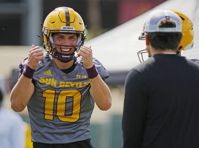 ASU quarterback Sam Leavitt (10) laughs after a completed pass during a spring practice at Kajikawa Practice Fields in Tempe on April 24, 2024.