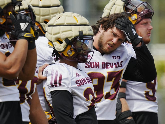 ASU defensive back Cole Martin (center) waits for a drill during a spring practice at Kajikawa Practice Fields in Tempe on April 24, 2024.