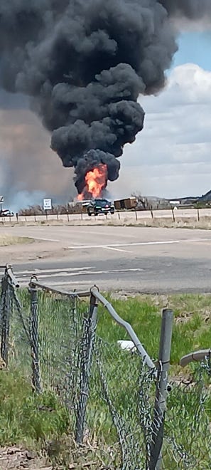 A view of the train derailment and subsequent fire as seen from the Good 2 Go truck stop near Lupton, Arizona, on April 26, 2024.