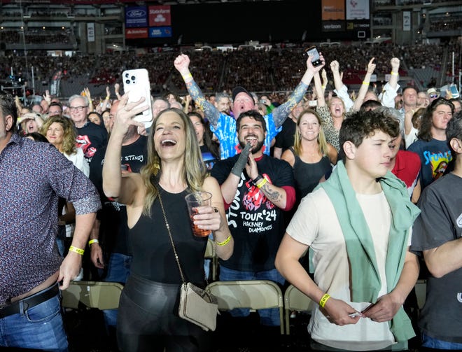 Fans cheer for The Rolling Stones during the Hackney Diamonds Tour at State Farm Stadium.