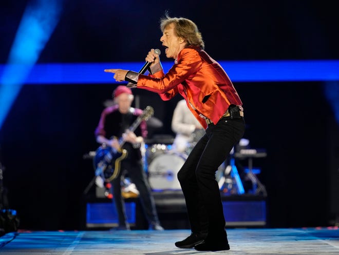 Mick Jagger and The Rolling Stones perform during their Hackney Diamonds Tour at State Farm Stadium. c