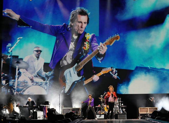 The Rolling Stones’ Ronnie Wood is projected on a screen as they perform during their Hackney Diamonds Tour at State Farm Stadium on May 7, 2024, in Glendale, Ariz.