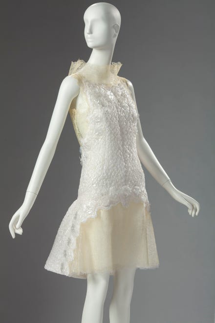 Karl Lagerfeld, Dress, 2012.  Polyester, acrylic, silk and nylon with polyurethane lace and a silk and nylon lining. Collection of Phoenix Art Museum, gift of Neiman Marcus