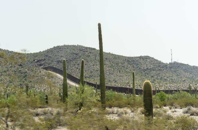 Construction workers installing 30-foot steel bollards at Organ Pipe Cactus National Monument in southern Arizona are accused of dumping metal and other leftover construction materials across the border into Mexico, where residents of the border city of Sonoyta, Sonora, gather those materials and sell them for scraps to make ends meet.