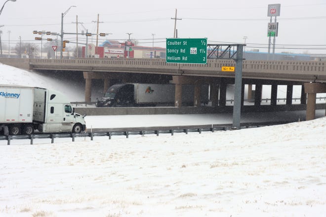 Traffic on I-40 was confined to one lane in each direction during Sunday's winter storm.